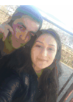 a man and a woman posing for a picture together