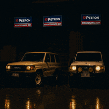 a silver car is parked in front of a petrol station