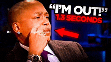 a man in a suit and tie is sitting in front of a sign that says i 'm out ! 1.3 seconds .