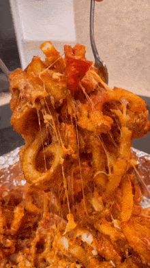 Pizza Curly Fries Cheesy GIF - Pizza Curly Fries Cheesy Curly Fries GIFs
