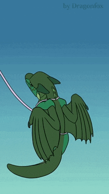 a drawing of a green dragon tied to a string