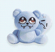 a blue teddy bear with red eyes is sitting on a white background