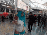 a woman in a costume stands in front of a sign that says " ax auto show "