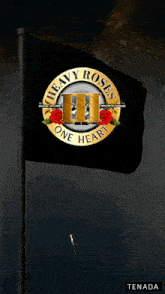 a heavy roses one heart flag is flying in the wind