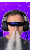 a man wearing headphones and sunglasses is smoking a cigarette