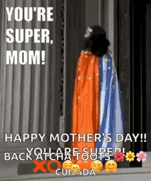 a woman in a cape is standing in front of a door .