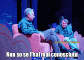 two men are sitting in chairs with the caption non so se l ' hai mai conosciuto