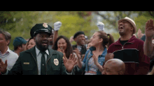 a man in a police uniform has a name tag that says ' williams ' on it
