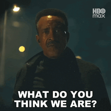 a man says " what do you think we are " in front of a hbo max logo