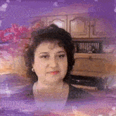 a woman is standing in front of a purple background with a clock in the background