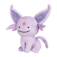 a purple stuffed animal with big ears and a pink nose