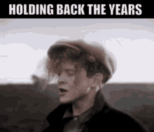 Simply Red Holding Back The Years GIF - Simply Red Holding Back The Years I Keep Holding On GIFs