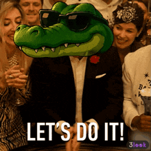 a cartoon of a crocodile wearing sunglasses with the words let 's do it