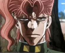 a close up of a person 's face with pink hair and a shadow on his face .