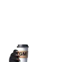 a hand is holding a cup of coffee with gm written on it