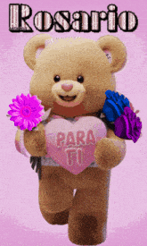 a teddy bear holding flowers and a pink heart that says para ti