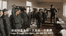 a group of soldiers are standing in a room with chinese writing on the wall