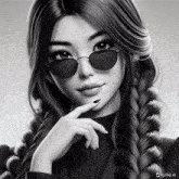 a black and white photo of a girl wearing sunglasses