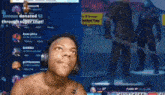 a shirtless man wearing headphones is playing a video game on a computer screen .