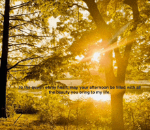 the sun is shining through the trees and a poem is written below it