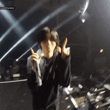 a person giving the middle finger with the word europe plus behind