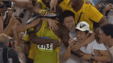 Hugging Usain Bolt GIF