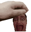 a pixel art of a hand holding a man 's head with his tongue out .