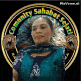 a woman in a blue shirt is surrounded by two lions and the words community sahabat selari