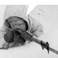 a black and white photo of a person holding a rifle in the snow