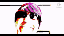 a pixelated image of a man wearing a hat and sunglasses