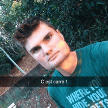 a man wearing a shirt that says where you hide your pets is taking a selfie