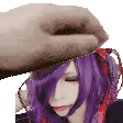 a woman with purple hair is being patted on the forehead by a hand .