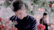 Seth Gecko Dj Cotrona GIF - Seth Gecko Dj Cotrona Looking At Plants GIFs