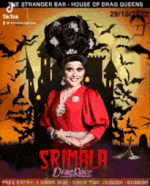a woman in a red dress is standing in front of a castle with bats flying around her .