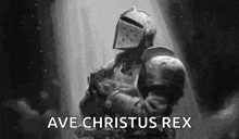 a black and white painting of a knight with the words `` ave christus rex '' written on the bottom .