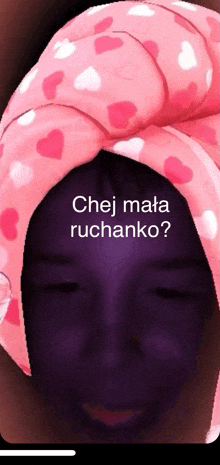a woman wearing a pink headband with hearts on it says ' chej mata ruchanko '