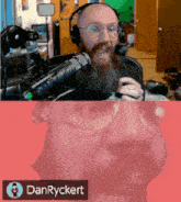 a man with a beard is wearing headphones and talking into a microphone with a danryckert sticker below him