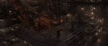 doctor strange is standing in front of a fire circle in a room .