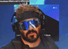 a man wearing sunglasses and headphones with the words goodness gifted a sub to williamslaye