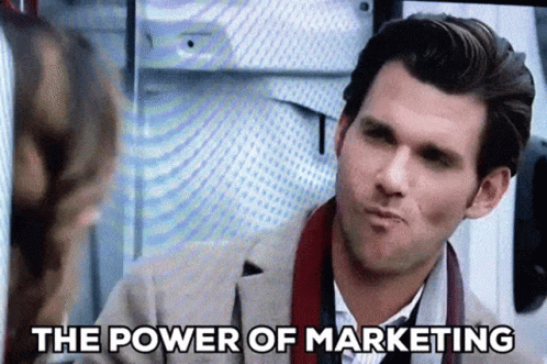 gif of a man eating and saying "the power of marketing"