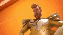 a man with a beard and mustache is wearing a gold suit