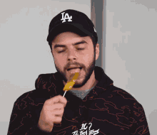 Tasting Lollipop GIF - Tasting Lollipop Taste Test GIFs