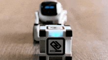 a toy robot with the letter n on the front