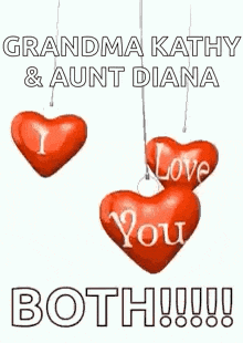 three red hearts hanging from a string with the words `` grandma kathy and aunt diana both '' written on them .