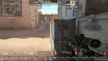 a screenshot of a video game with a green sniper rifle in the foreground .