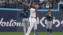 a baseball player with the number 3 on the back of his shirt
