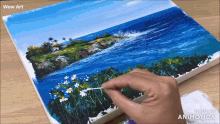 a person is painting a landscape with the words wow art above