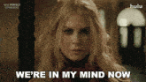 a woman says we 're in my mind now in front of a sign that says nine perfect strangers