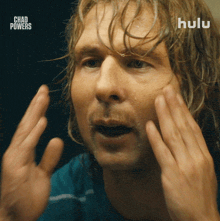 a man is washing his face with the words chad powers behind him