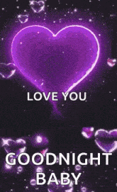 a glowing heart with the words `` love you goodnight baby '' written on it .
